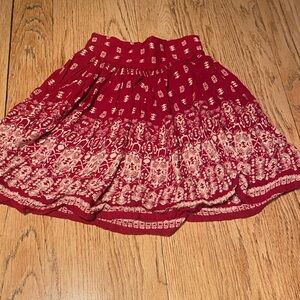 Adorable red and white patterned skirt with pockets